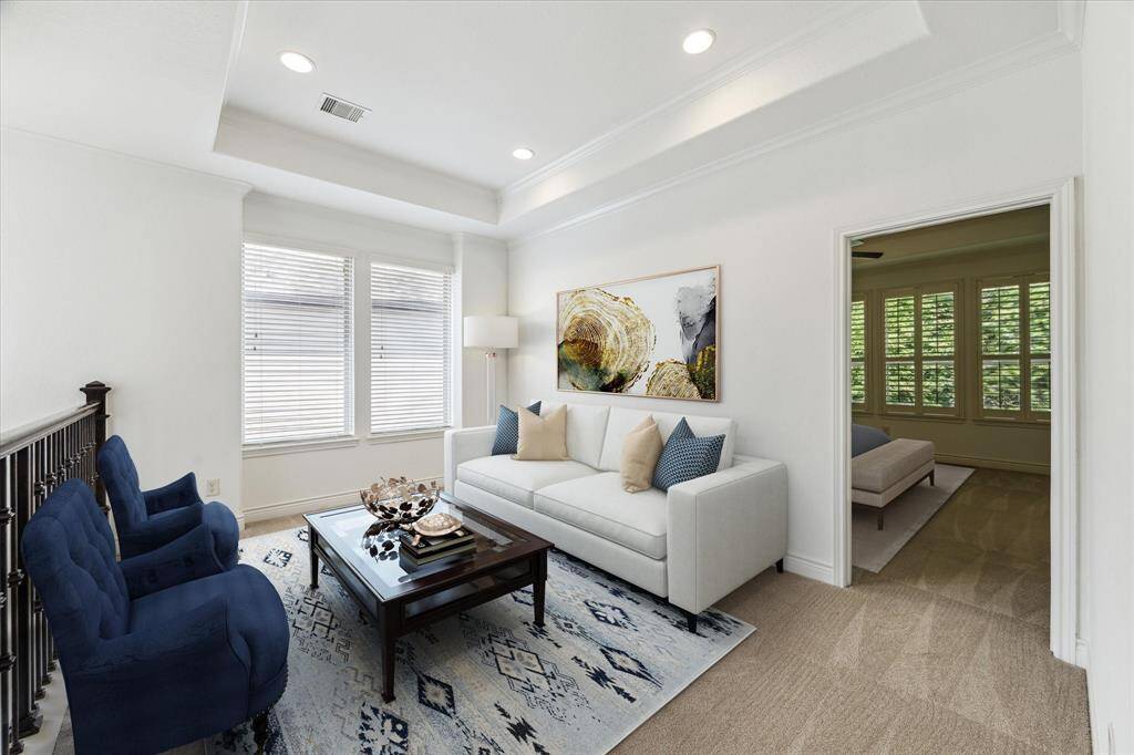 Virtual stage photo of the upstairs den.