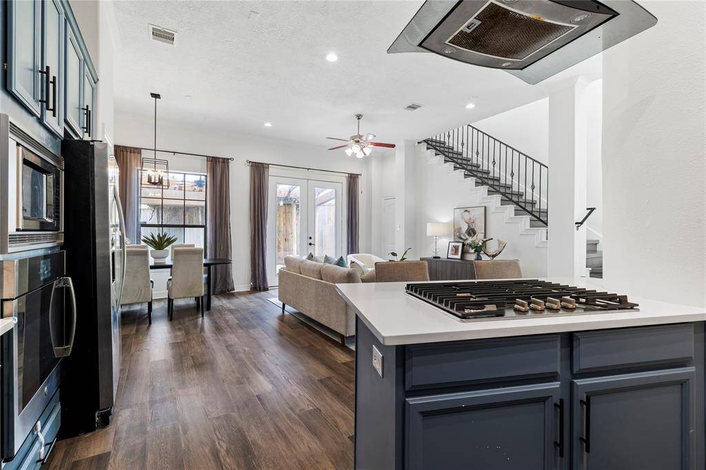 Open kitchen concept connects effortlessly with the dining and living areas.