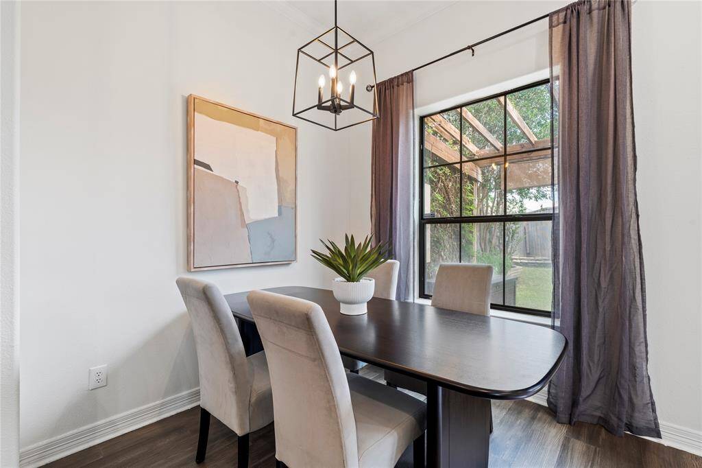 Dedicated dining space with open flow to kitchen and living, ideal for gatherings and meals.