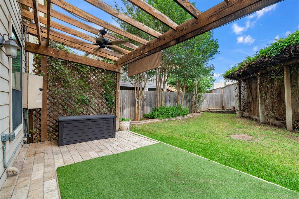 Covered patio creates a seamless indoor-outdoor flow off the main living space.