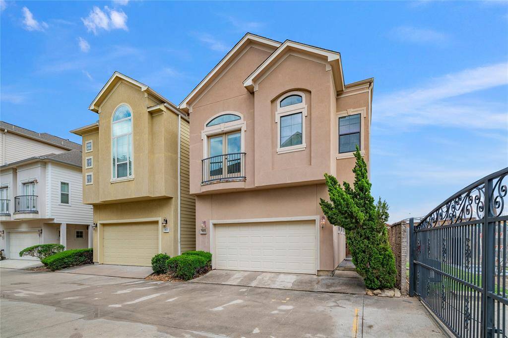Traditional elevation meets city convenience in this secure, well-kept enclave.