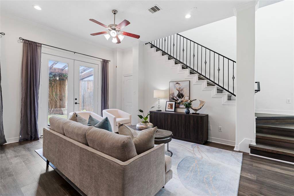 Enjoy casual elegance in this open-concept living room, perfect for everyday living and entertaining.