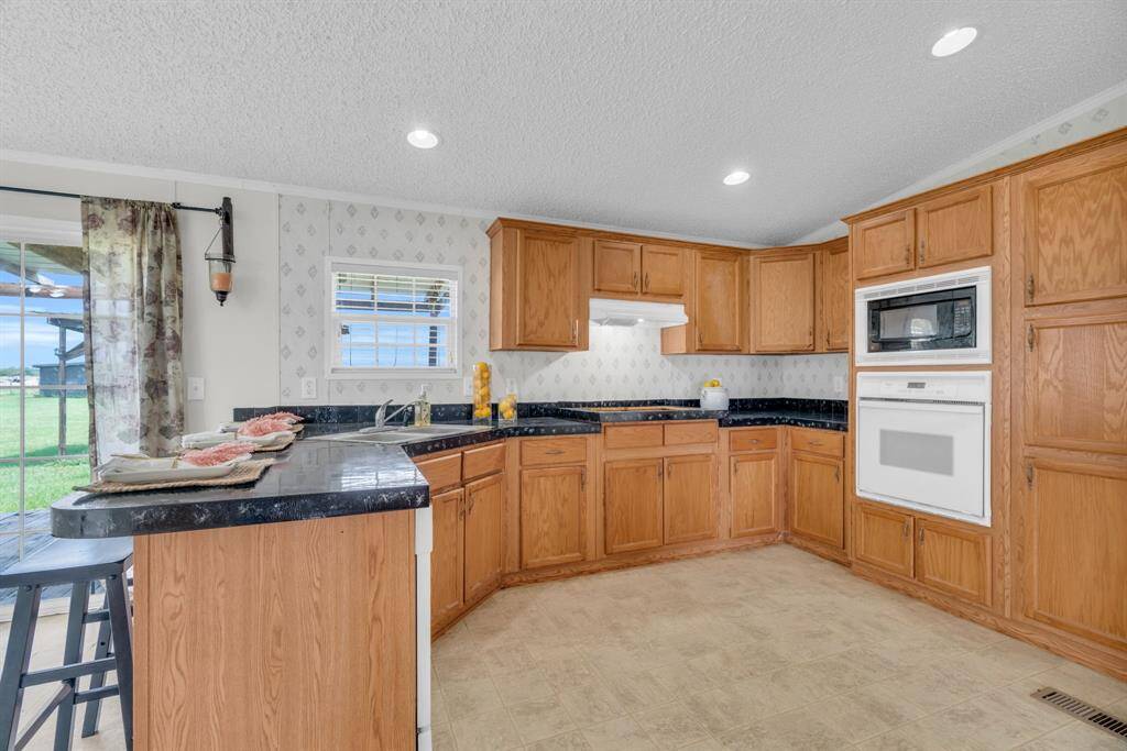Large Kitchen Area for Your Cooking Needs! 37038 Bell Rd.,Waller, TX 77484