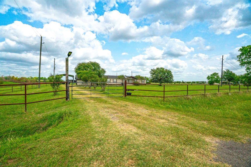 Fully Gated Property - Entrance & West Side of Property Follows Driveway! 37038 Bell Rd.,Waller, TX 77484
