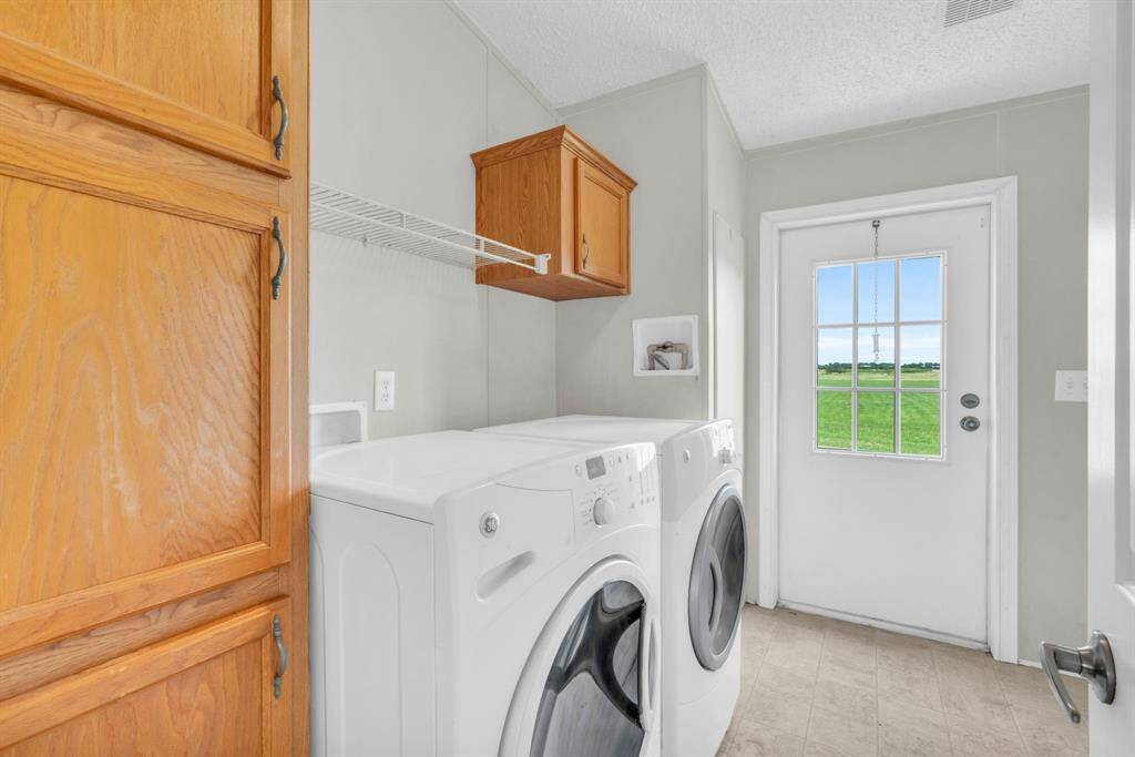 Laundry Room complete with a Washer & Dryer! 37038 Bell Rd.,Waller, TX 77484