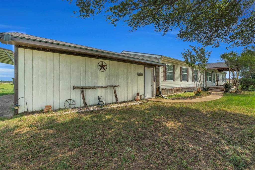 3 Car Detached Garage provides space for a Workshop! 37038 Bell Rd.,Waller, TX 77484