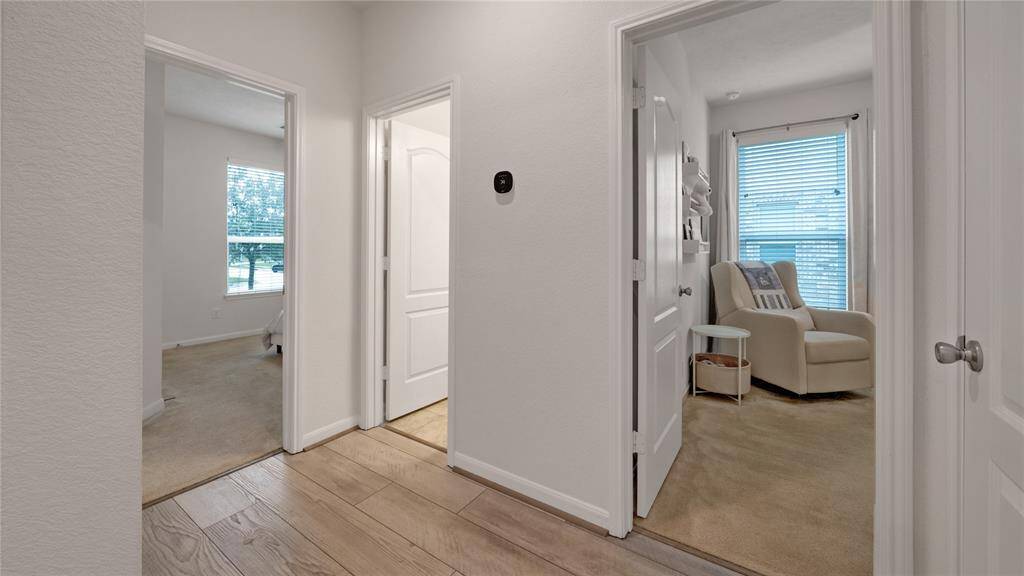 Hallway into the secondary bedrooms & bathroom.