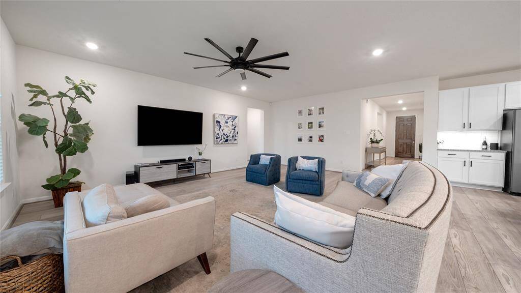 Spacious family room with sight lines to the front door.
