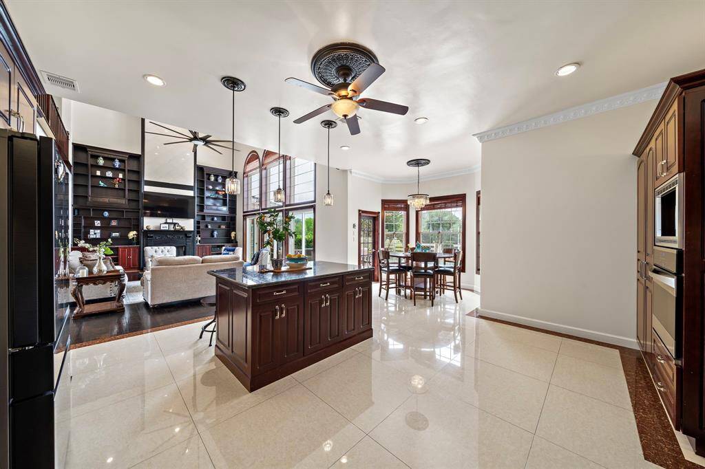 Looking from the kitchen sink area towards the living room.