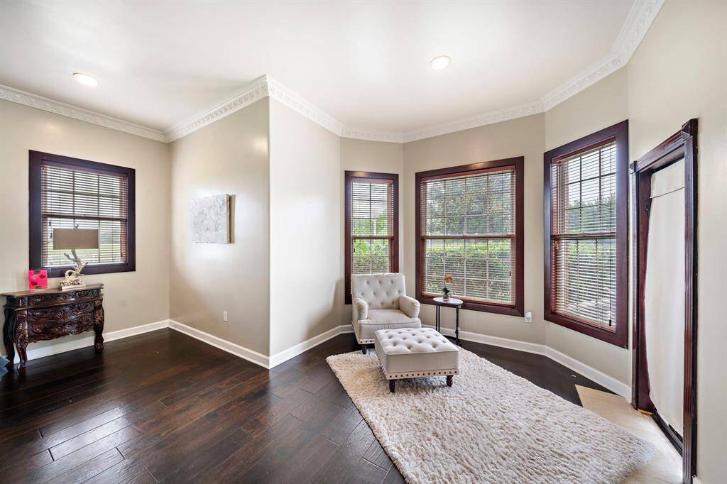 The sitting area includes a door to the outside pool and spa.