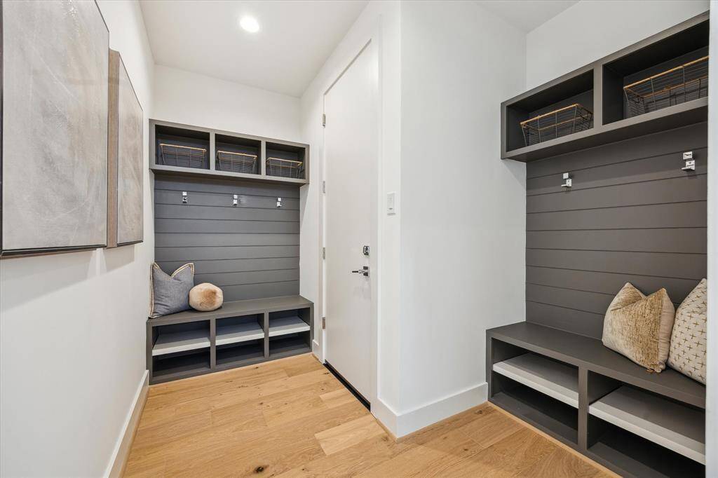Mud room/drop zone off oversized garage. PLENTY of storage here and garage area!