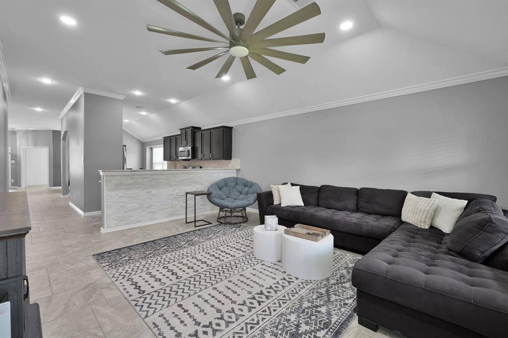 Living room open to the kitchen