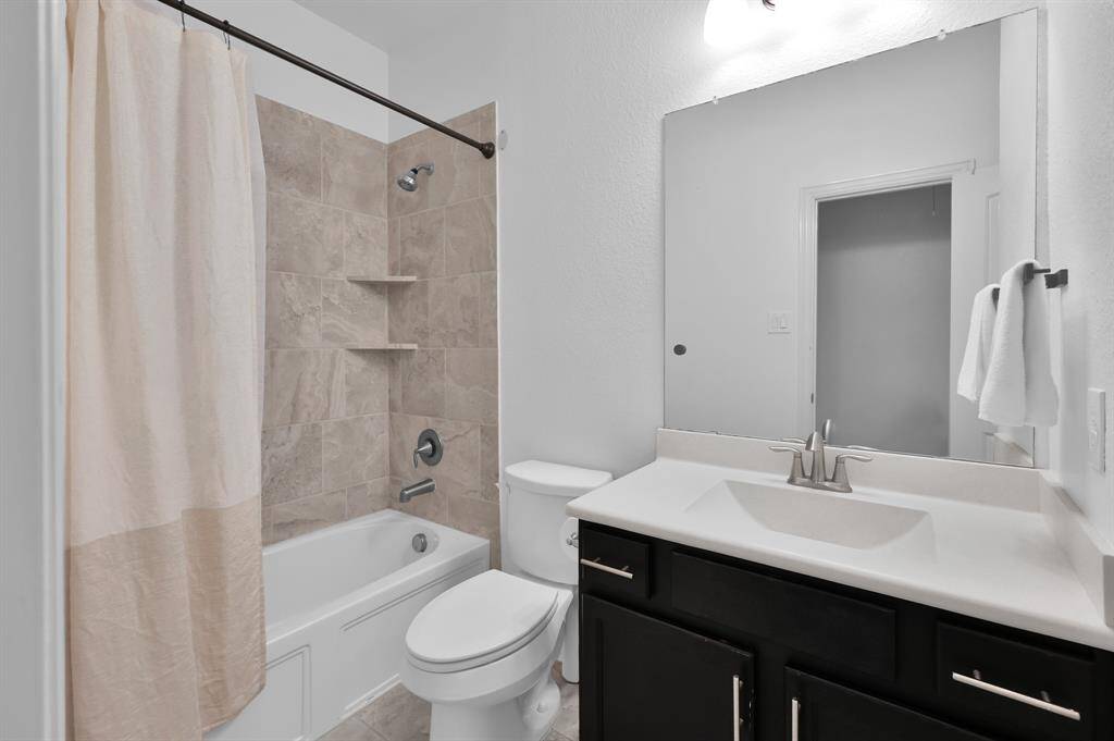 Secondary bathroom with linen closet (not shown)