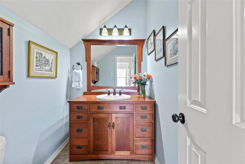 Hospitality is felt throughout the home and the powder room is no exception.