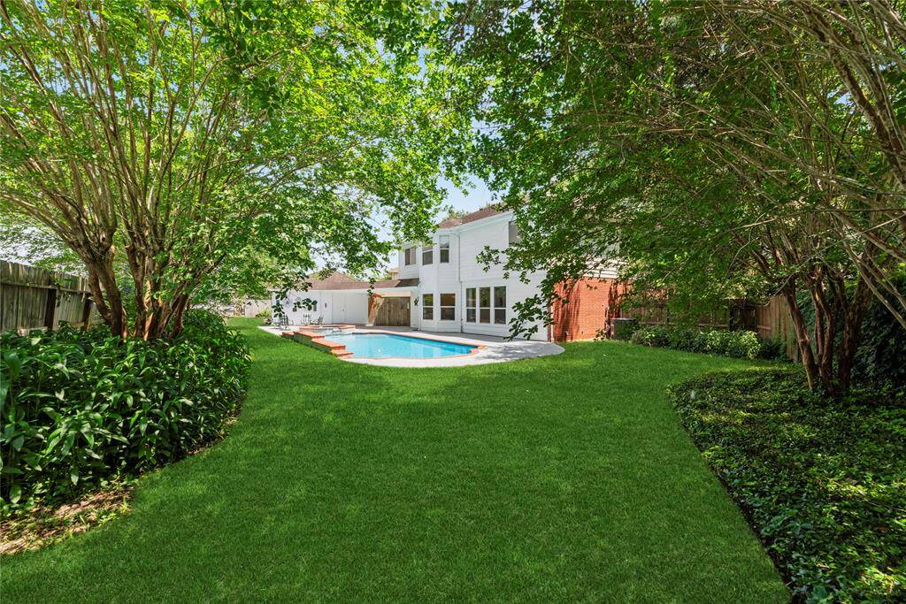 Level and flat, the outdoor space is perfect for playing a game of tag or kickball. For extra fun, set up a playground area for the kids or install raised garden beds for fresh veggies and fruits.