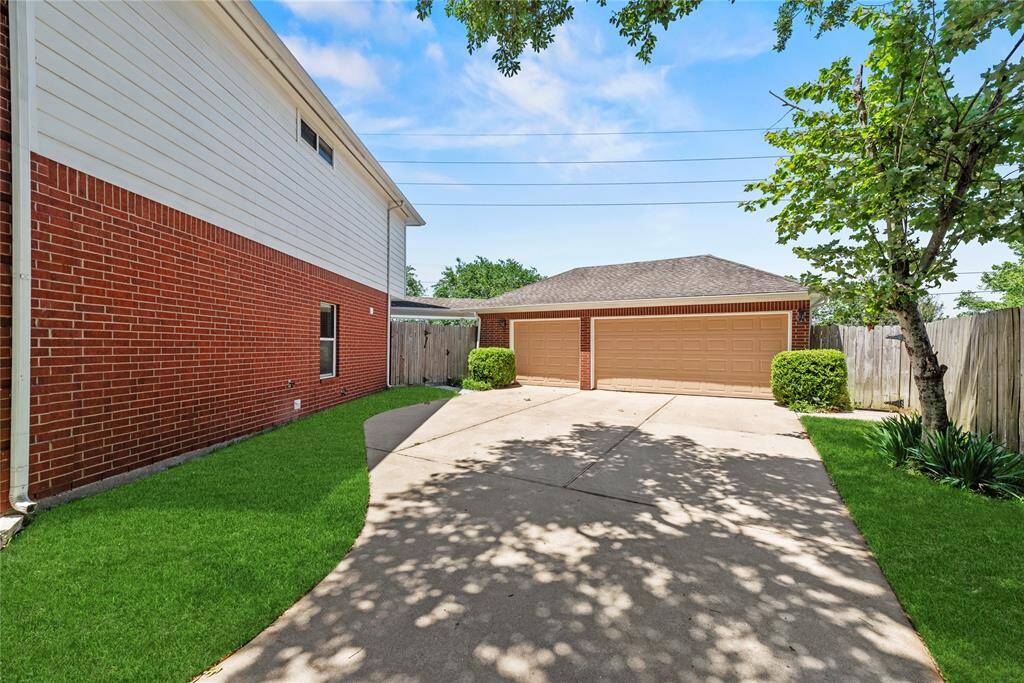 This home includes a spacious three-car garage, providing ample room for vehicles, storage, or a workshop. It's perfect for families with multiple cars or those needing extra space for hobbies and equipment.