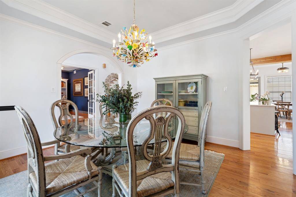 The dining room opens to the entry and kitchen areas.