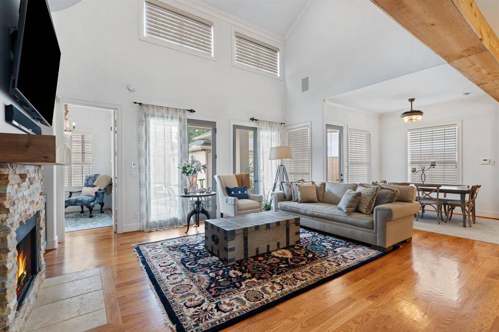 The family room provides access to the primary suite, backyard covered patio, and has open access to the breakfast area and kitchen.