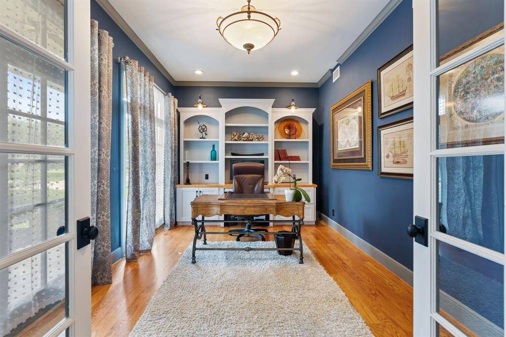 Just off the entry, French doors lead to a stunning dedicated home office/study.
