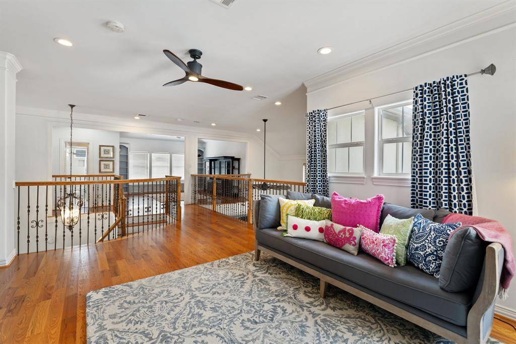 The spacious upstairs loft offers versatile flex space—ideal for a media lounge or additional living area.