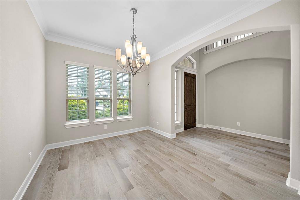The formal dining room is located off the front entryway of the home.