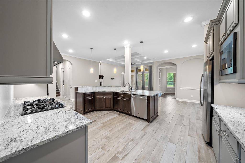 The kitchen overlooks the breakfast area and living room, making this a true open floor plan.