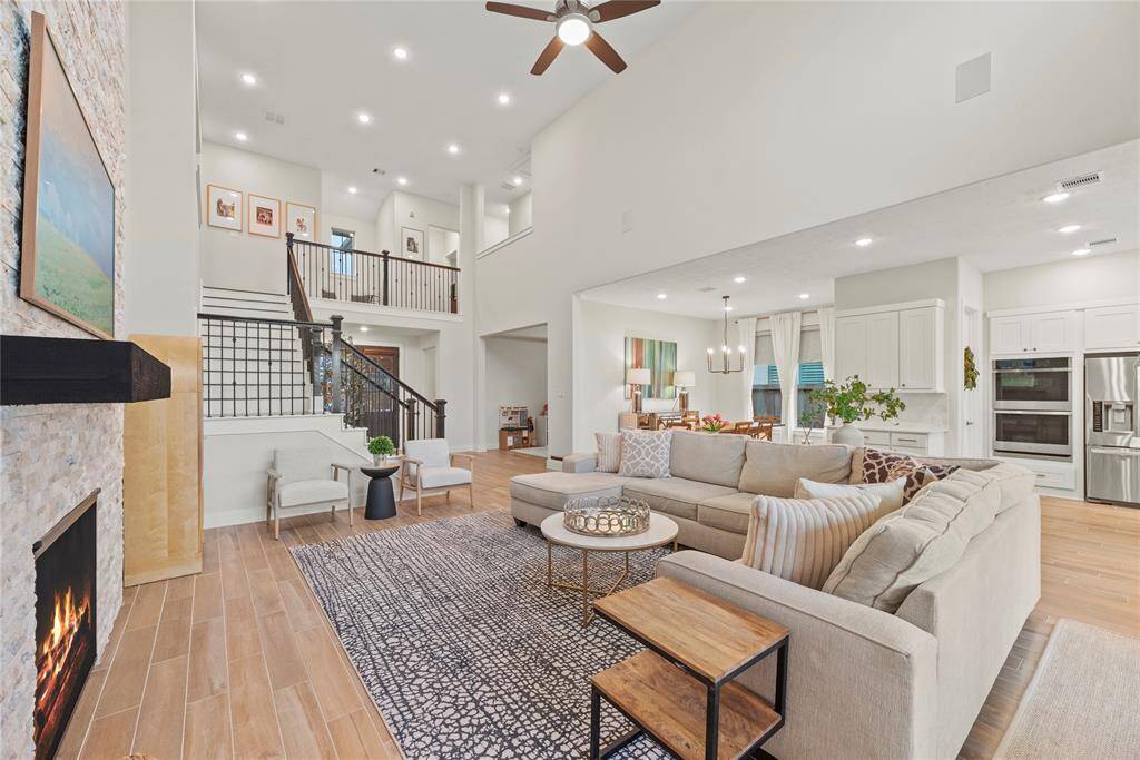 The open feel of the home encourages interaction and engagement, making it a welcoming and inviting place for family and friends to gather and enjoy each other's company.
