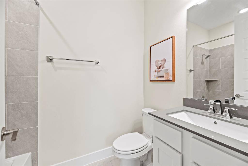 Full secondary downstairs bath for ease and convenience.