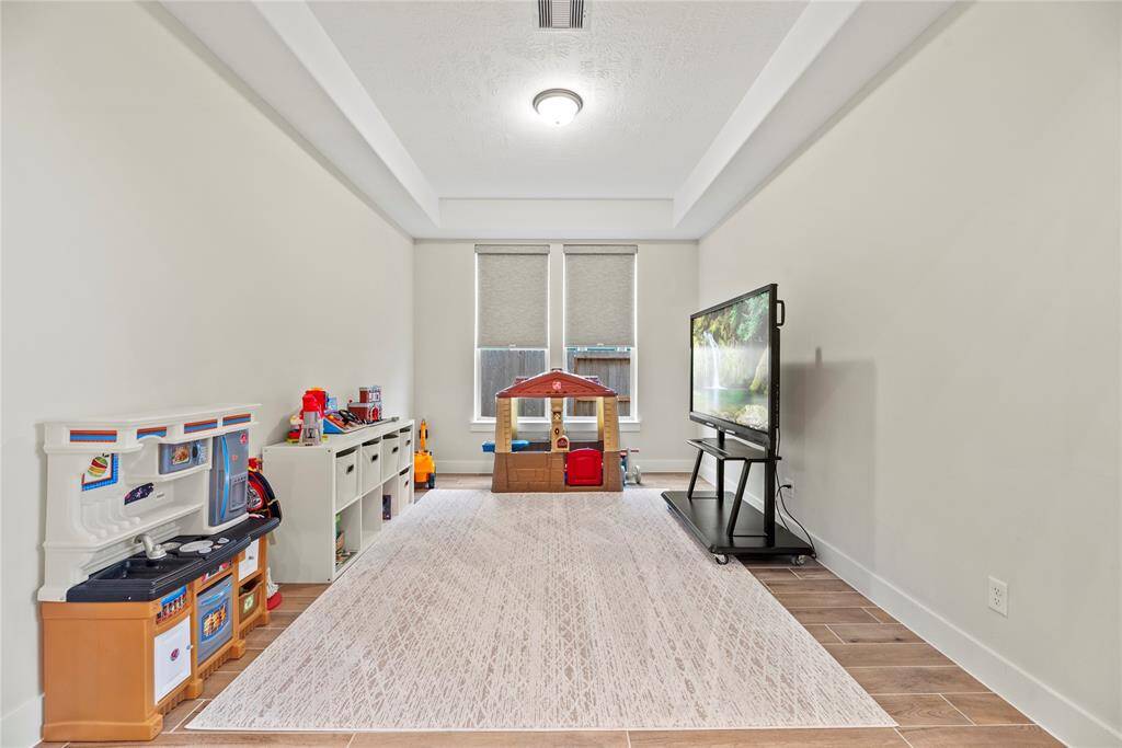 This is the most incredible flex room. A home office, play room? How would you use this space?