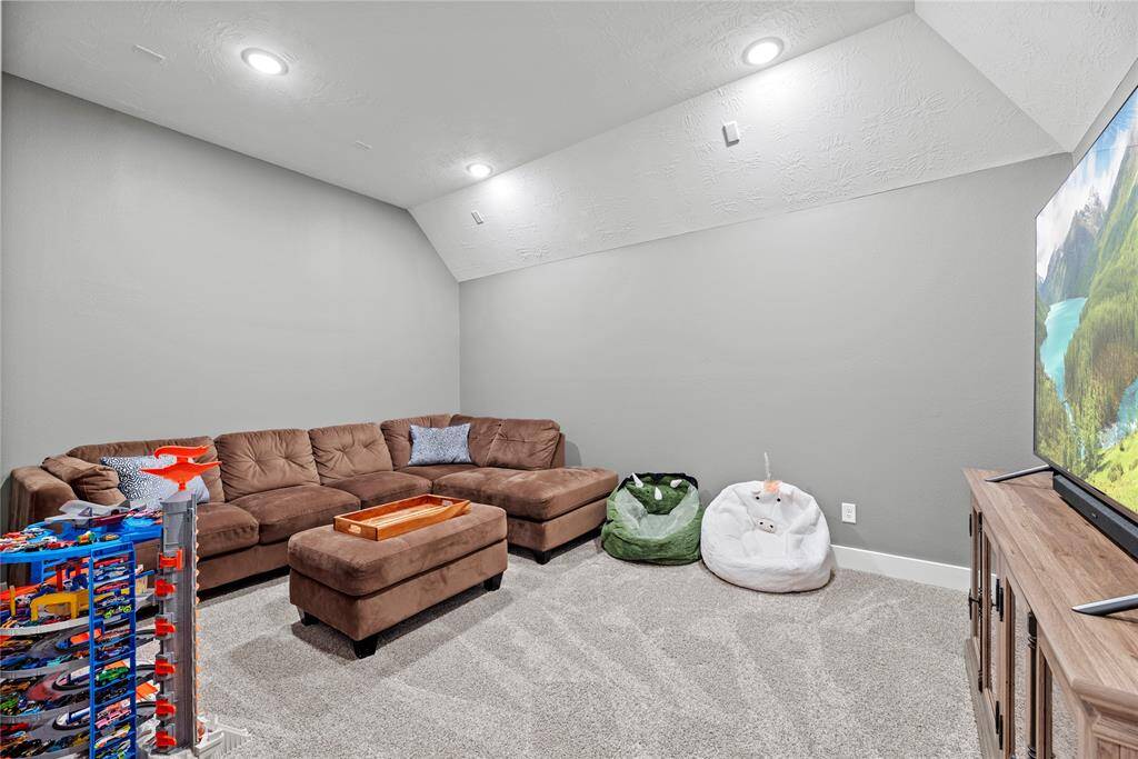 The media room is perfect for family movie nights.