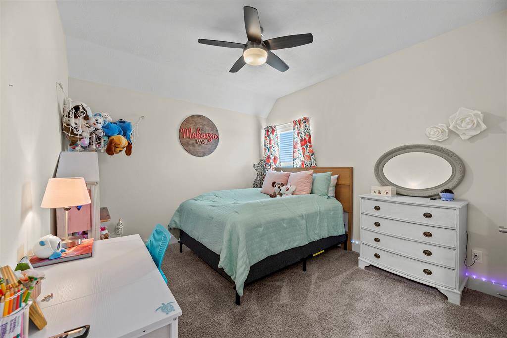 The thoughtfully designed layout of your fifth bedroom allows for natural light to flood the room, creating a warm and welcoming atmosphere.