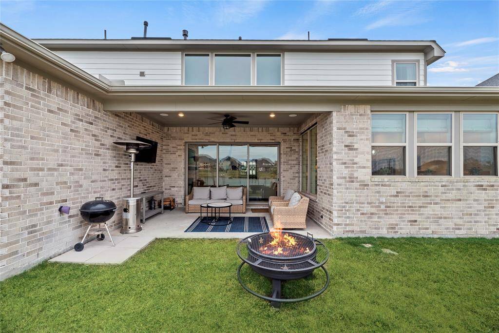 The covered patio is an easy place to sit back and watch the sunset or just get some you time in the fresh air.