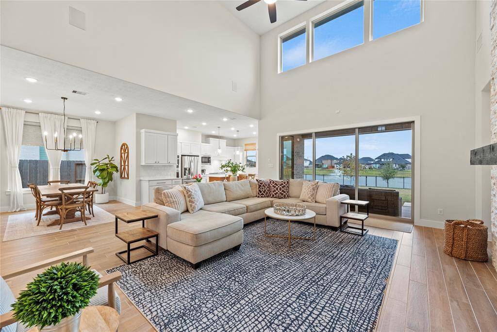 The sense of space is enhanced by the lack of visual barriers, making the entire area feel expansive and airy.