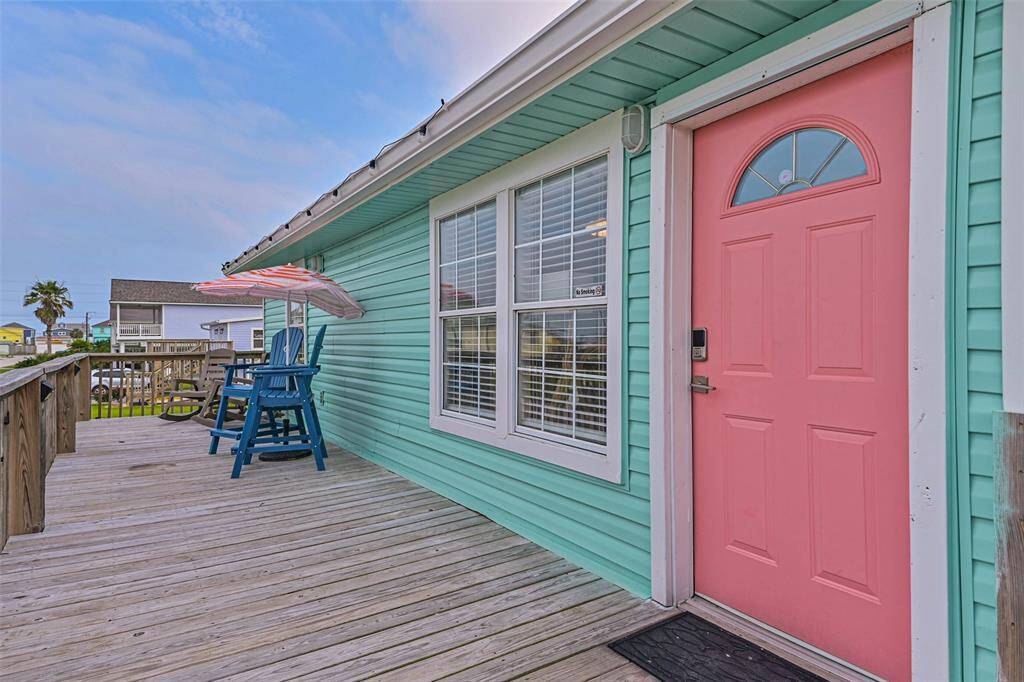 Upper deck and entry door to main level living space