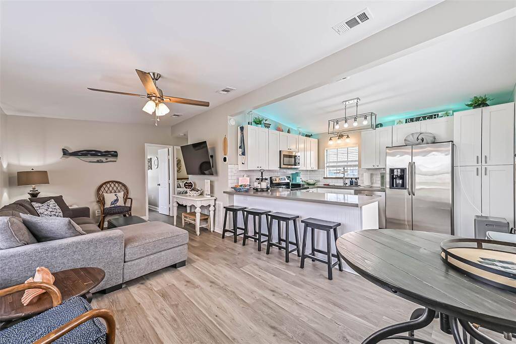 Open living and kitchen space with dining