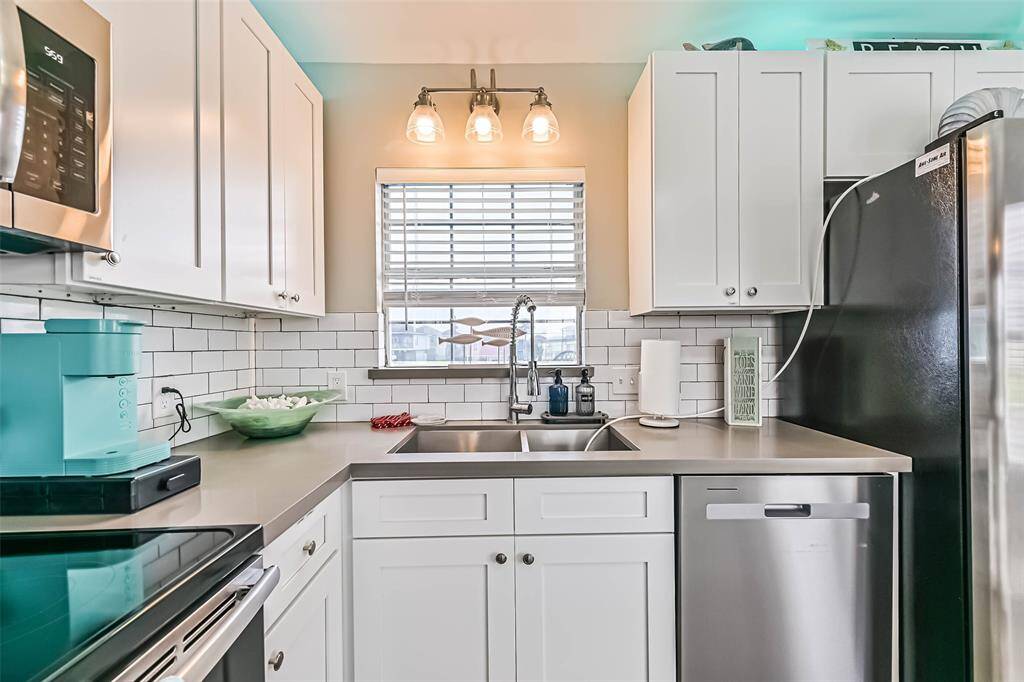 Kitchen with view of back yard