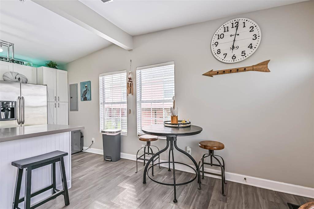 Vaulted ceiling between kitchen and living space