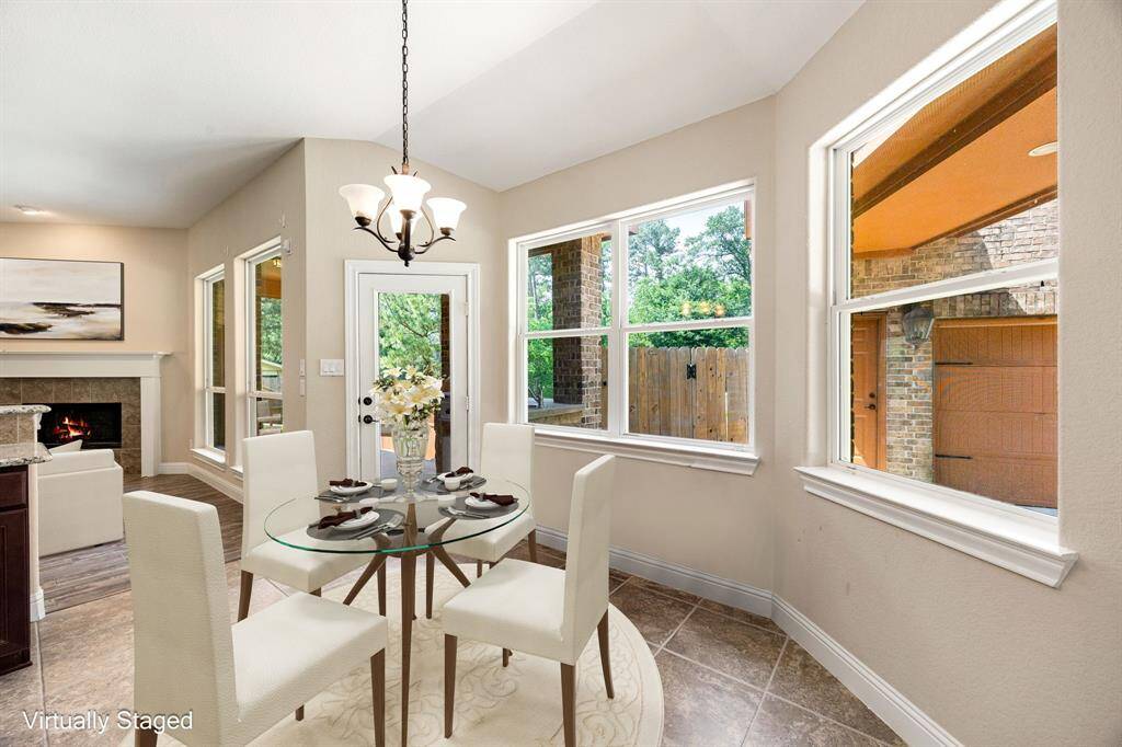Start your day off right with a cup of coffee sitting with your family in the lovely breakfast area! Featuring large windows with blinds, custom neutral paint, tile flooring, recessed lighting and high ceilings. *Virtually Staged