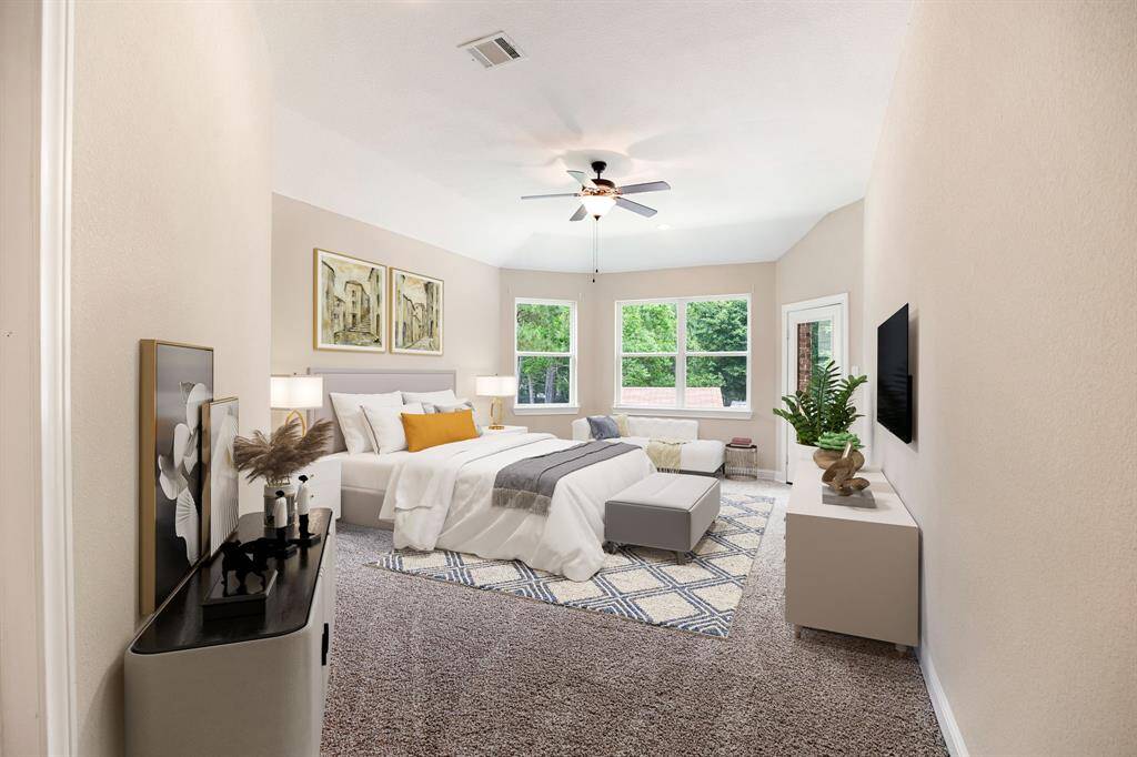 What a wonderful place to come home to, this stunning primary suite greets you with plush carpet, a warm custom paint, high ceiling, ceiling fan with lighting, lovely arched windows with blinds allowing in natural light brightening up this spacious primary bedroom, with extra space for a seating area. *Virtually Staged