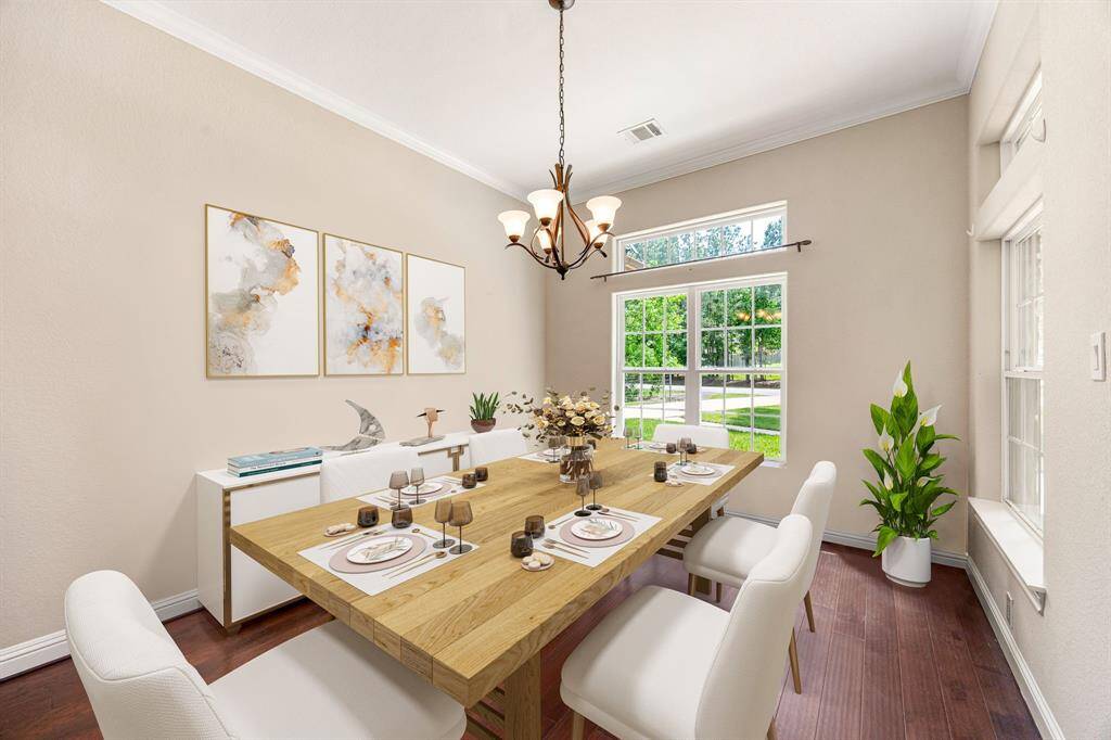 You and your guests will certainly dine in style in this amazing formal dining room! Featuring a large window providing plenty of natural light, neutral paint, high ceilings, crown molding, and wood style flooring. Perfect space to entertain family and friends. *Virtually Staged