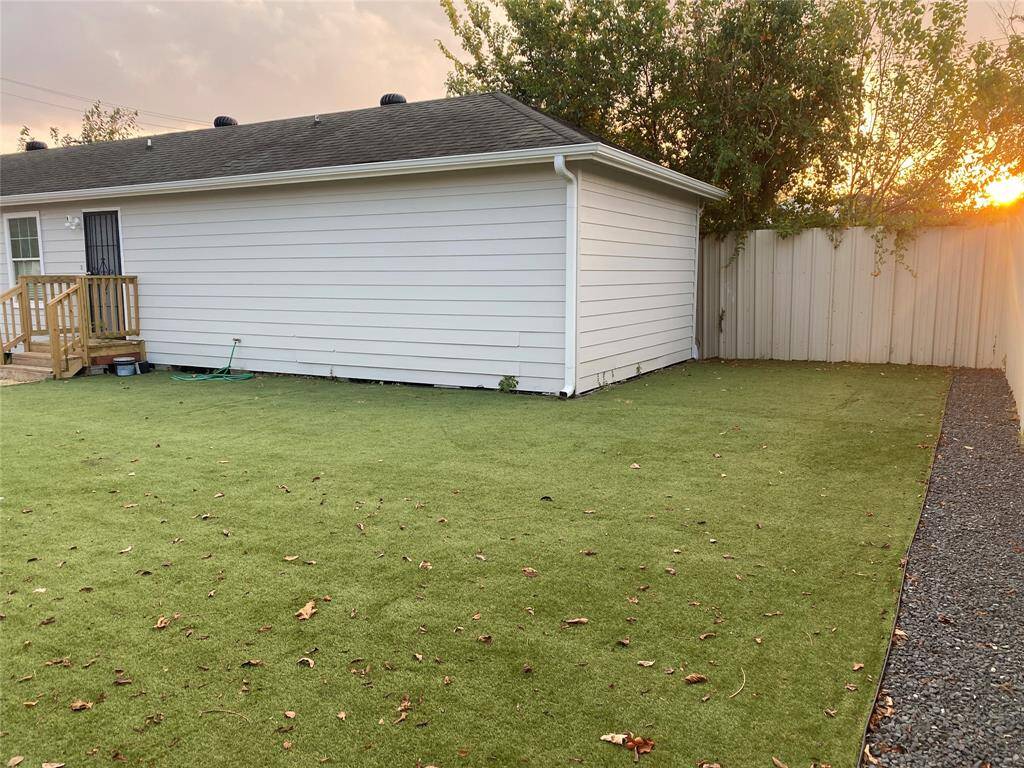 Imagine the backyard shenanigan that could take place on this newly turfed yard space! Add some string lights and cozy patio furniture.