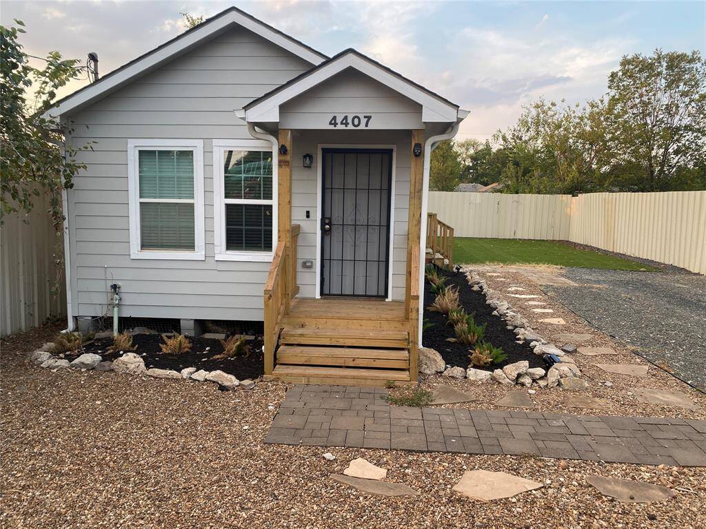 There is additional parking in the front of the home which has space to fit a trailer or other oversized vehicles.