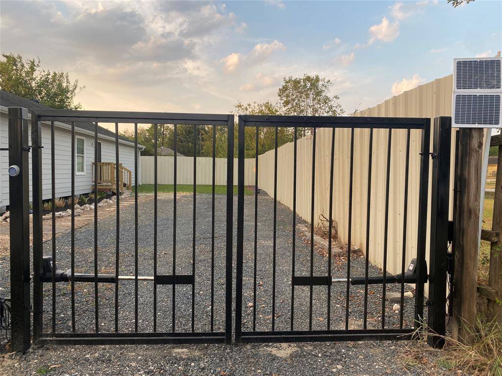 The gate will open inwards into the driveway.