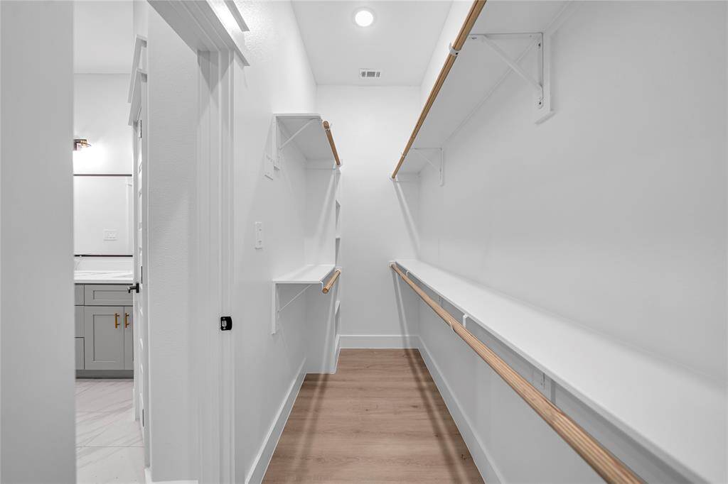 It includes a spacious Master bedroom walk-in closet with ample shelving