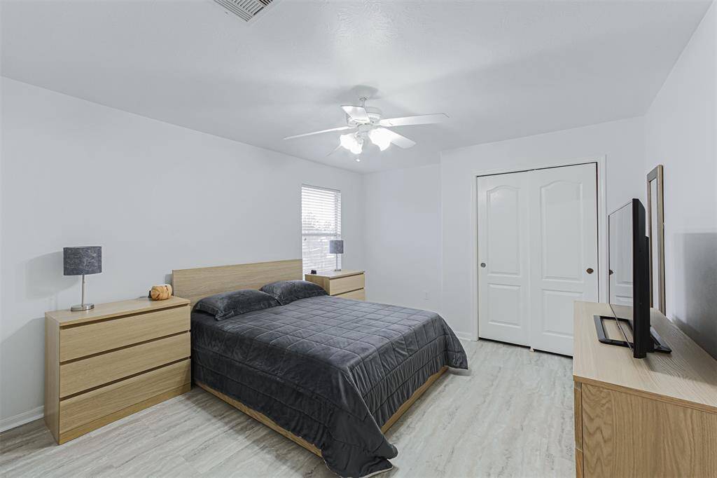 One of 3 bedrooms located upstairs.