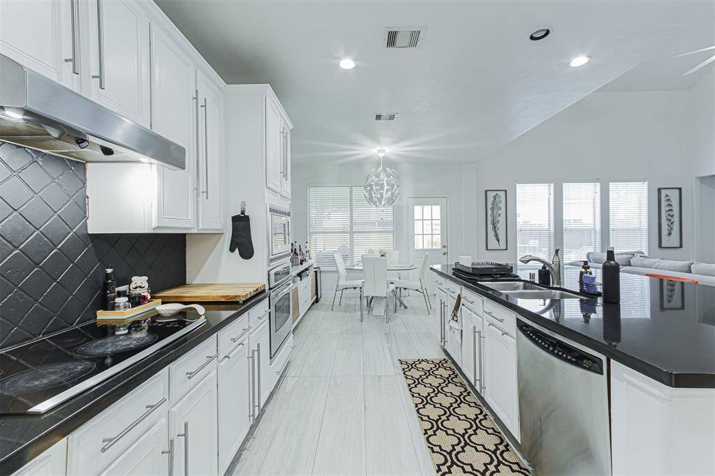 Tile flooring throughout the main level of the home for durability and easy clean up.