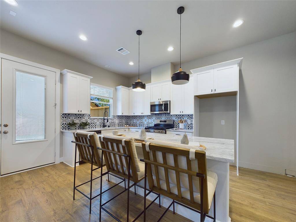Kitchen with island (staged model home)