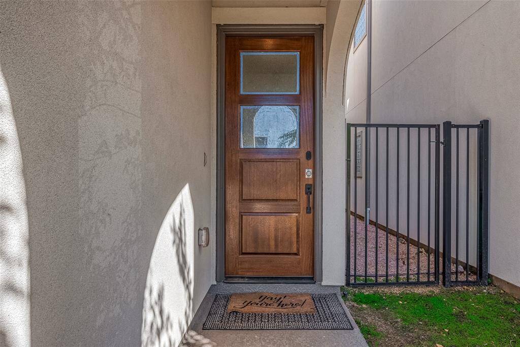 Entance to this Gorgeous 8 ft. wooden door.