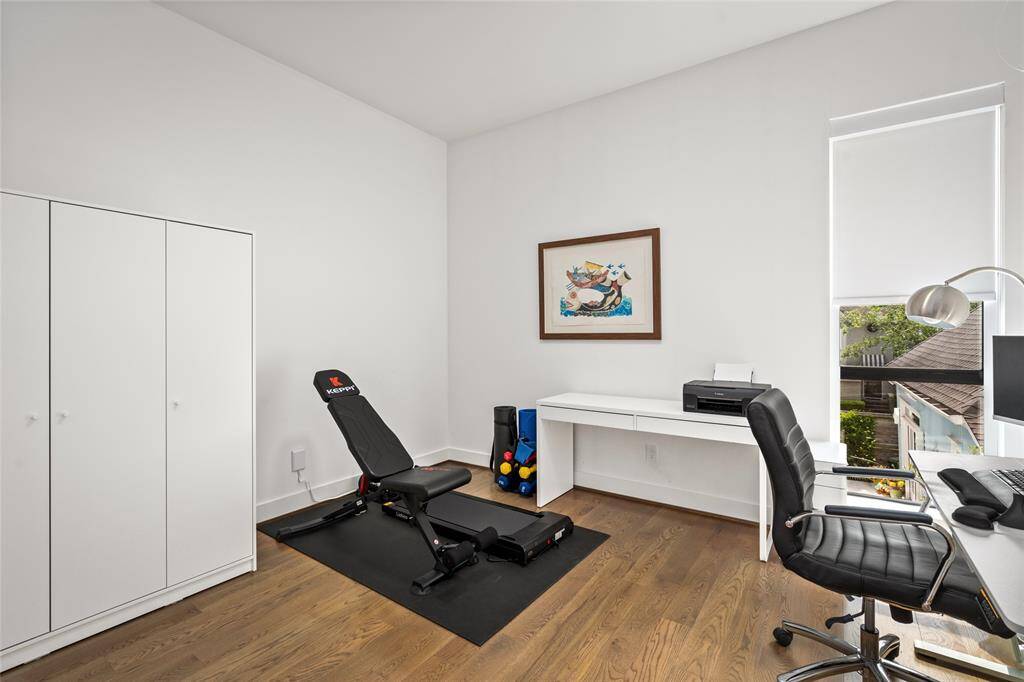 Versatile secondary bedroom or office space located on the second floor, adaptable to your needs.