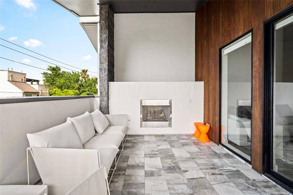 This space comes with an outdoor fireplace!